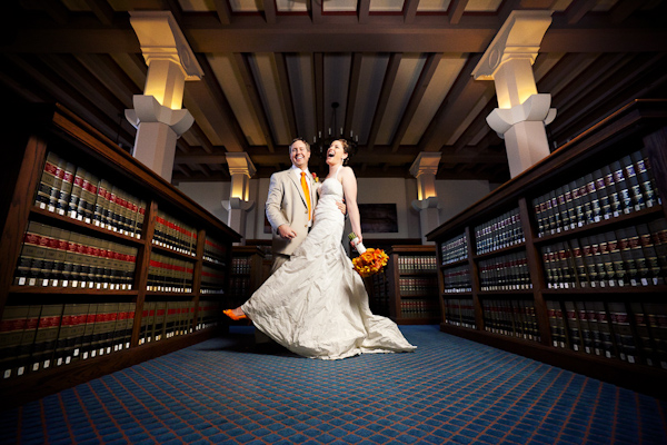 portrait of happycouple laughing in library - photo by Southern California wedding photographers Callaway Gable